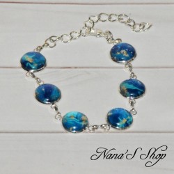 Bracelet, boucles d' oreilles et bague assorti, cabochons motif abstrait bleu & or.