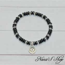 Bracelet fantaisie, élastique en perles d' Hématite, strass et pendentif œil en métal argenté, style Bohème Chic.